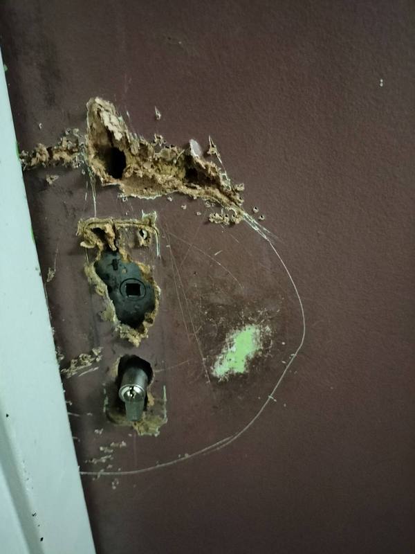 Damaged door lock after forced entry — we open without damage