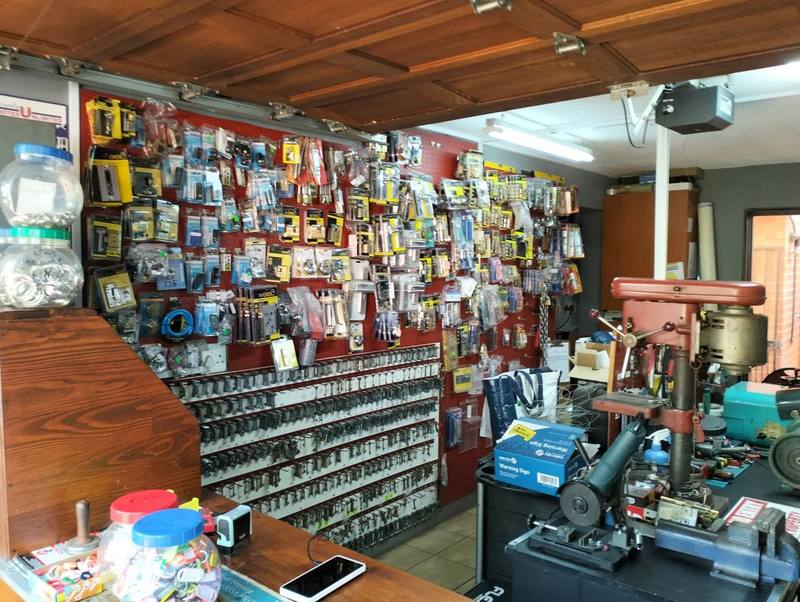 ER Locksmith Enterprises workshop — full stock wall